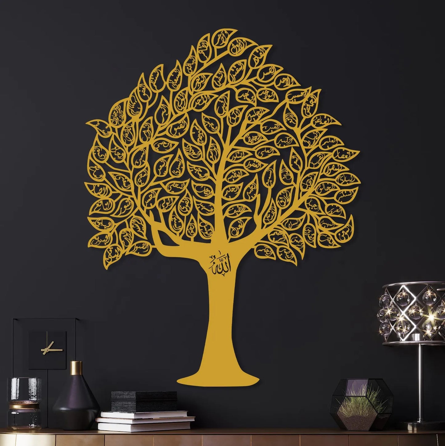 Gold metal Tree of 99 Names of Allah Islamic wall art on a dark charcoal wall