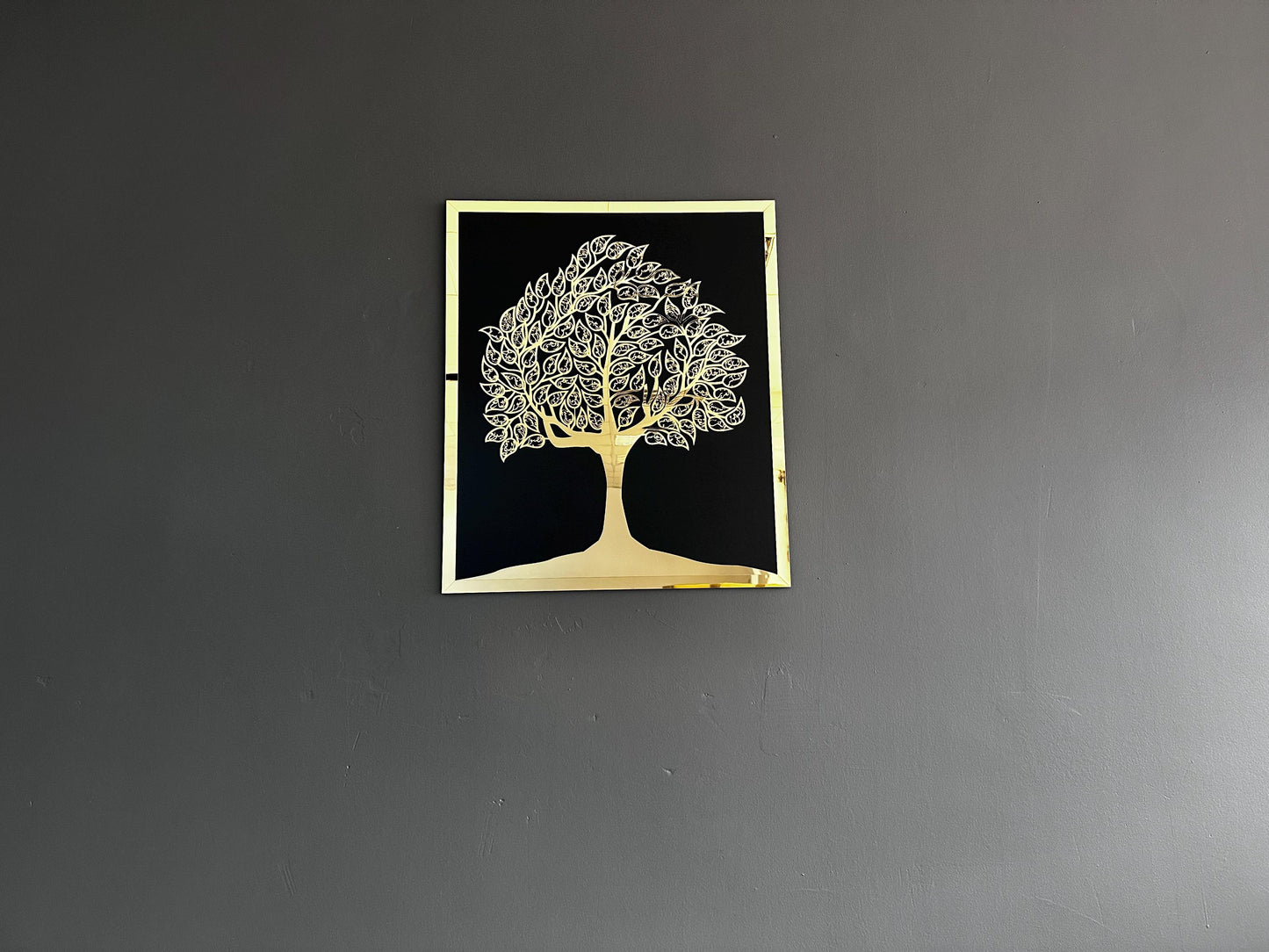 Islamic tree of life calligraphy wall art shown to scale on a charcoal wall