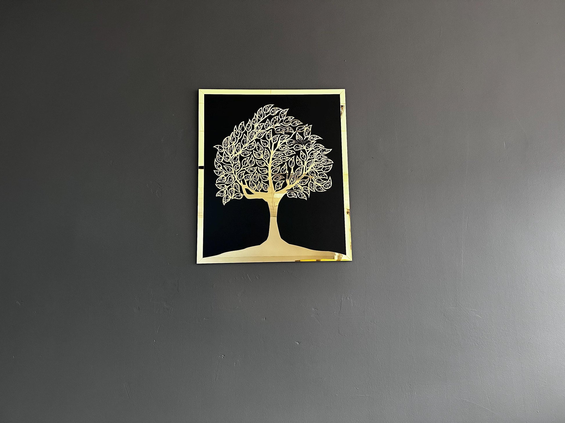Islamic tree of life calligraphy wall art shown to scale on a charcoal wall